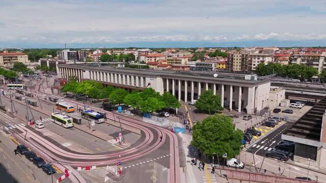 Aerial drone view of Padova Railway Station in Padua, Italy, showcasing the major transport hub, rail infrastructure, and surrounding urban landscape of the Veneto region.