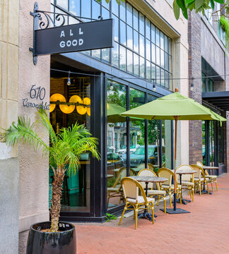 New Orleans, LA, USA - June 13, 2026: All Good Cafe next to the Barnett Hotel on Carondelet Street in Downtown