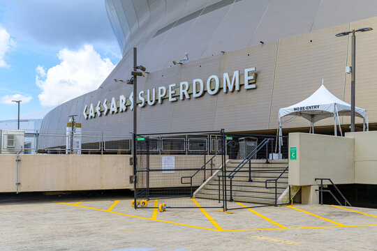 New Orleans, LA, USA - June 13, 2026: Side of Caesars Superdome with Steps Blocked by Metal Security Fence