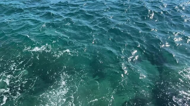 Rough Mediterranean Sea waves against rocky coastline