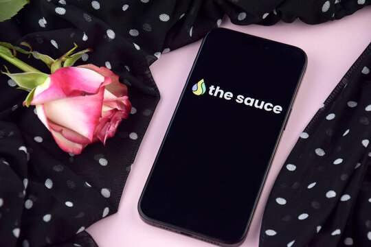 The sause dating app on smartphone screen.