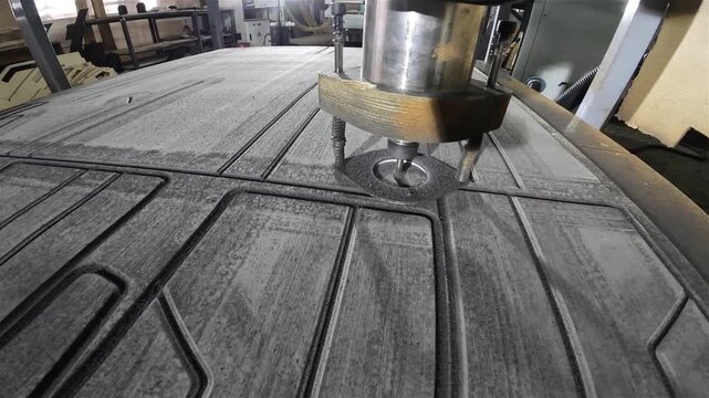 Close Up of CNC Milling Tool in Action. CNC Milling of EVA Foam Marine Decking Material. Custom manufacturing of motorboats and yachts. Production of boat decking. 