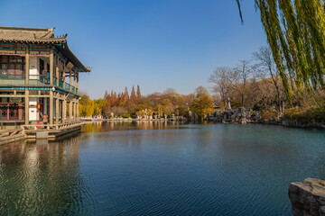 Fototapeta premium Traditional Pavilion by the Lake in Wulongtan Park, Jinan, Shandong, China