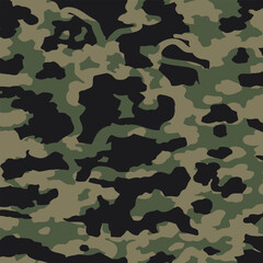 Fototapeta premium Classic woodland camouflage seamless pattern with layered military shapes in olive, black and beige tones, Seamless pattern for textile prints on fabric and wallpaper.