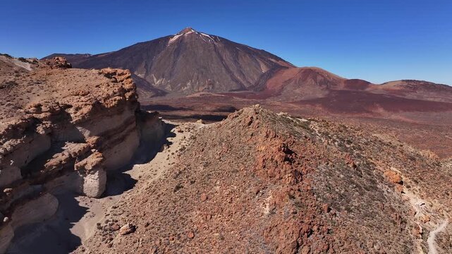 Aerial view over Guajara cliff formations towards Mount Teide in Teide National Park, Tenerife