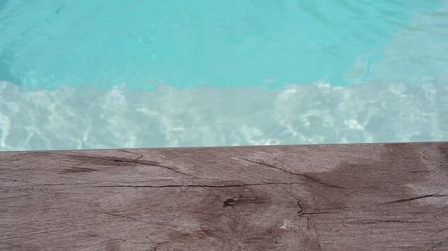 A swimming pool in France during a heatwave and the hottest day recorded in the country.