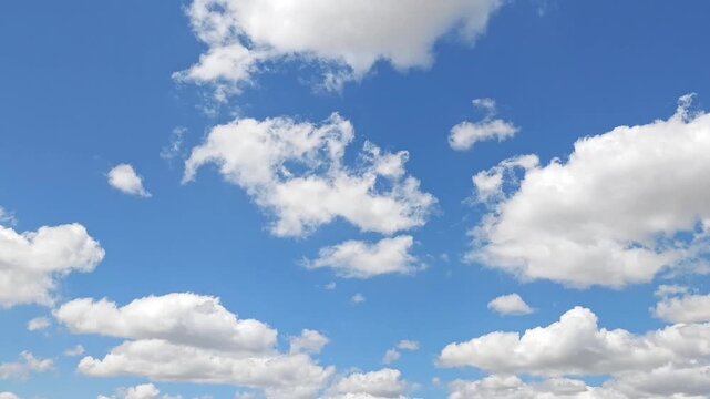 Spectacular and divine landscape of the sky with white clouds at midday