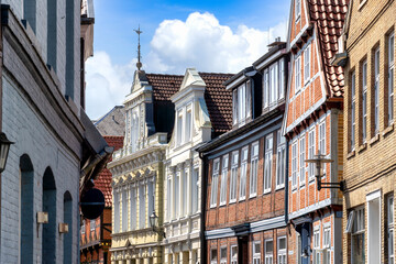 Obraz premium Stade, Germany, historic old town lane with richly decorated facades, timber framed houses and northern German architecture