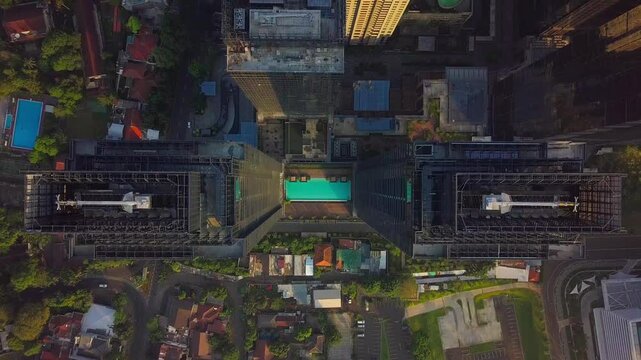 tracking drone shot of the Sudirman Central Business District (SCBD), Central Jakarta.