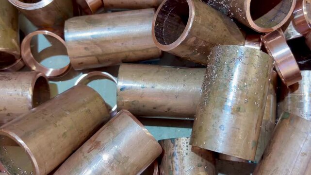 Copper tube offcuts waste from a factory ready to be recycled