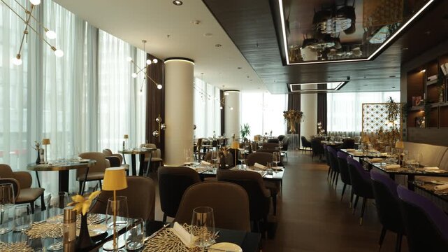 Elegant restaurant dining room set up for dinner service