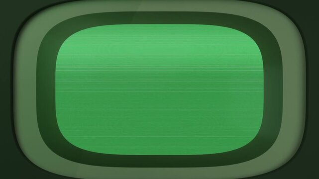 Showing rounded display booting at dark panel with bezel, green field, scan lines, flashing white