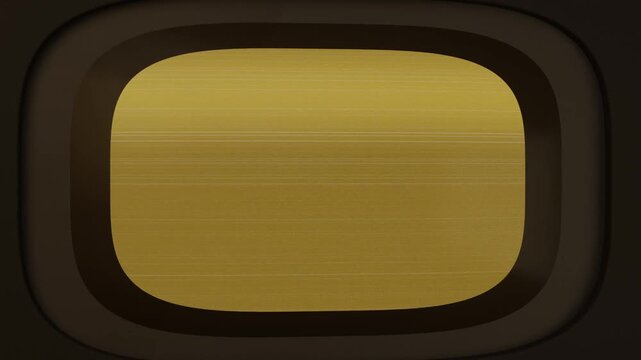 On playback showing rounded screen expanding gold line into field in dark bezel with white flash