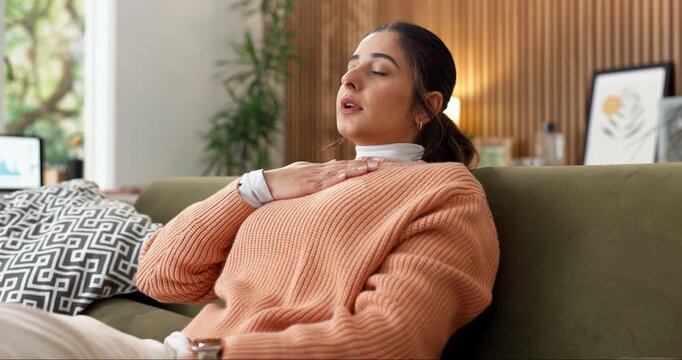 Stress, pressure or woman with chest pain on sofa from panic attack, shortness of breath or fear. Respiratory illness, person or anxiety for asthma in home for discomfort, heart palpitations or worry