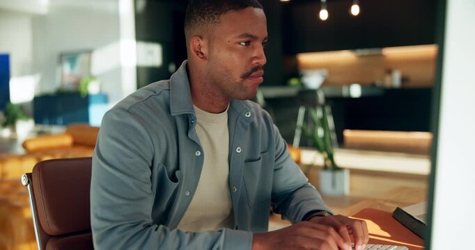 Black man, reading and remote work in home with computer, research or ideas for copywriting. Thinking, male person or freelancer at house with pc, proofreading and typing email for article submission