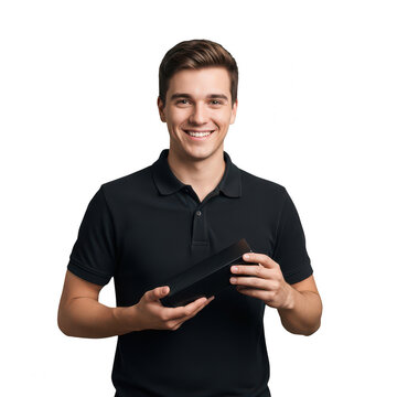 Young man holding a black box in his hands isolated on transparent background