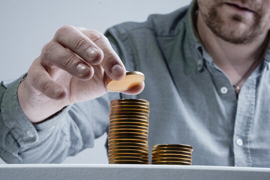 Build a column or tower of coins - growth recorded. Business progress, long-term savings concept.