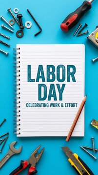Labor day text on spiral notebook surrounded by various metal tools