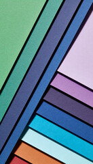 Fototapeta premium Abstract arrangement of colorful textured paper sheets creating a modern geometric design