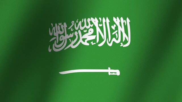 Saudi Arabia Flag: The national flag of Saudi Arabia, a vibrant green field with white Arabic calligraphy and a sword, waves proudly.