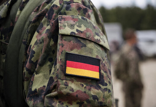 Close-up of German Flag Patch on Camouflage Uniform