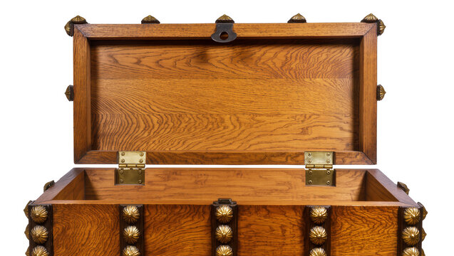 Isolated vintage rustic wooden storage chest with open lid and decorative brass hardware