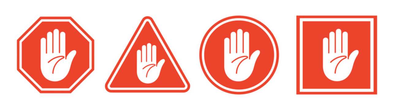 Stop Sign Variety: A collection of four distinct red stop signs, each featuring a white open hand symbol, conveying a universal message of halt and caution.
