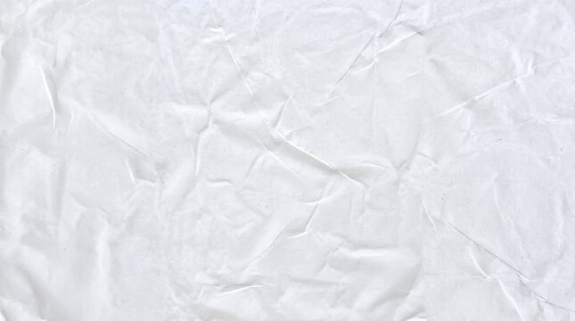Heavily crumpled white tracing paper with sharp intricate creases