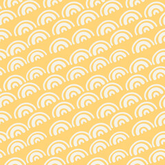 Yellow fish scale and rainbow seamless pattern. Abstract hand drawn white arches vector background for textile and nursery design. © Ольга Ломонос