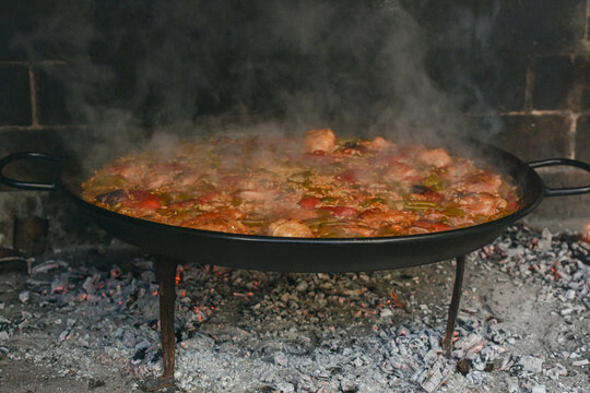 Traditional Valencian paella ready to serve in wood fired oven