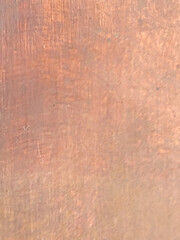 Fototapeta premium Weathered Copper Metal Surface with Natural Oxidation Marks and Warm Industrial Texture Background