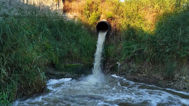 The moment treated wastewater from the city of Burdur is discharged into Lake Burdur. Stock video footage on environmental management, water treatment plants, and sustainability.