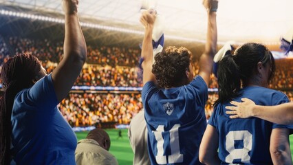 Soccer fans celebrate in stadium stands after winning competition trophy, football supporter reacting with joy to goals scored and positive match result. © DC Studio