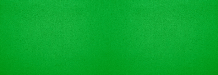 Fototapeta premium Textured background. Decorative plaster wall, external of facade. Texture of light green stucco plaster wall of clay house structure background. clay cement texture pattern