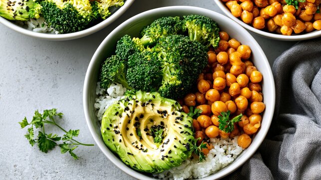 Close-up of Fresh Salad Bowl with Broccoli, Chickpeas, and Sliced Kiwi on Light Surface