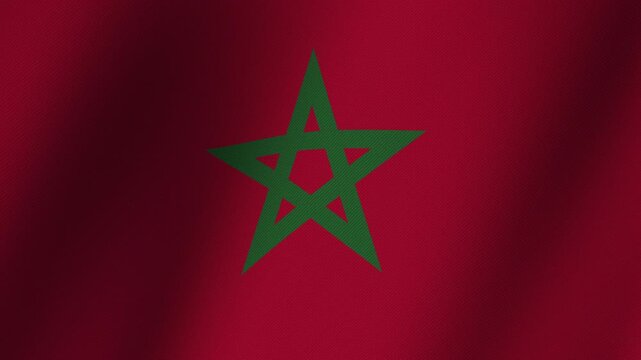 Flag of Morocco: A close-up view of the national flag of Morocco, showcasing its deep red background and prominent green pentagram star.