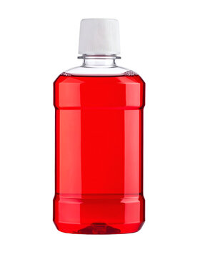 Close up of a plastic bottle filled with bright red antiseptic mouthwash liquid sealed with a white measuring cap&nbsp;&nbsp;