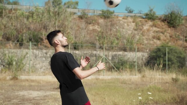 Amateur Soccer Player Practicing The Header Shot