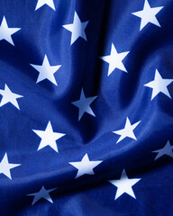 Fototapeta premium Patriotic blue american flag fabric with white stars texture