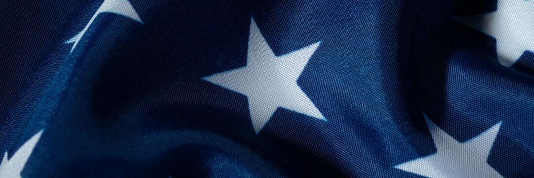 Panoramic american flag stars banner with blue textile texture