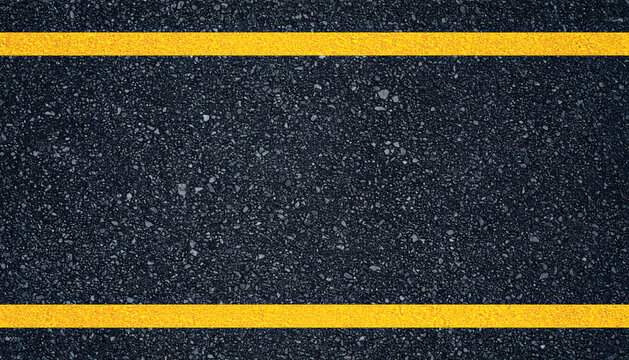 Dark asphalt road surface featuring two parallel vibrant yellow traffic lines running horizontally across the textured gritty black ground material texture background.