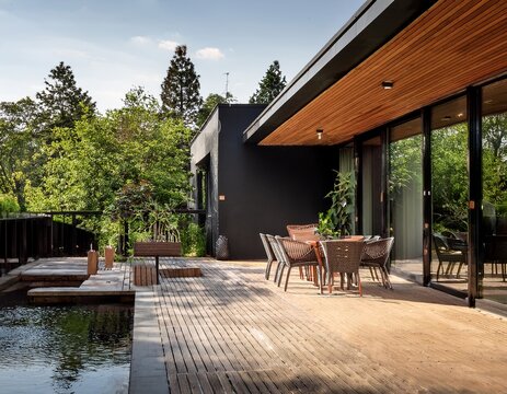 modern wood black glass studio adu backyard design