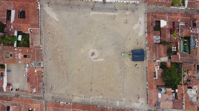 Horizontal_Aerial top drone view of Villa de Leyva, Boyac&aacute;, Colombia. Colonial city, stone cobbled streets and Plaza Mayor the second largest square in South America - tourist