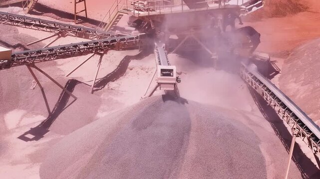 Dump Truck Unloading Crushed Stone at an Industrial Aggregate Processing Plant