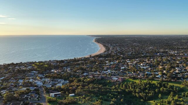 Seacliff, Adelaide, South Australia &ndash; 4K aerial drone footage of sandy beach, Gulf St Vincent coastline, sunset seascape, coastal suburb, beachfront homes, scenic shoreline, Kingston Park, Brighton