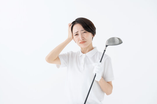 悩む女性　ゴルフ　白バック