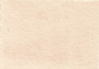 Bright clean pale peach cream handmade cotton rag paper texture with fine surface grain and tiny rustic imperfections. Beautiful luxury background template for wedding invitations, fine art prints.