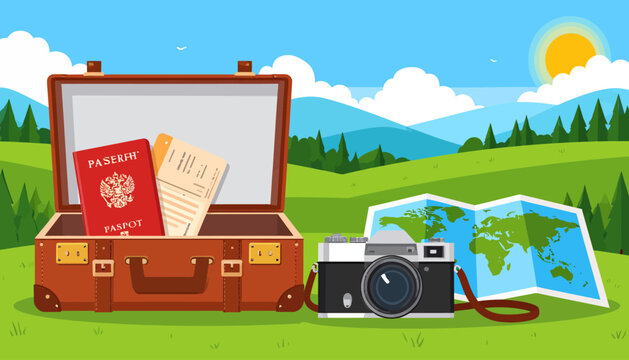 Open vintage leather suitcase with passport, airline ticket, camera and world map in a green nature landscape