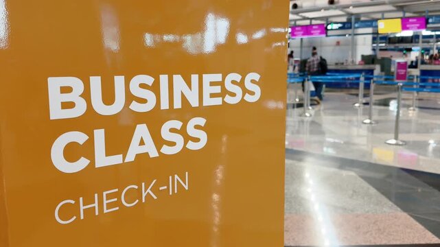 Business Class Check-In Sign at Airport Terminal