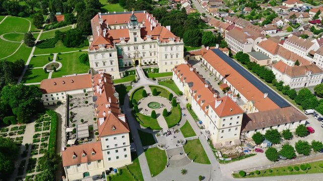 Drone aerial view of the magnificent Valtice Castle, a UNESCO-listed landmark in the Lednice&ndash;Valtice Cultural Landscape. Historic Baroque architecture, formal gardens, and courtyards in South Moravia.